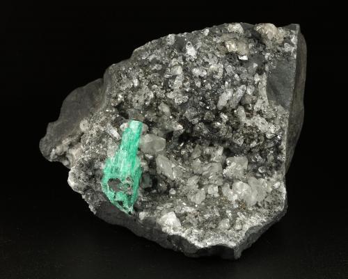 Beryl (variety emerald), Calcite, Pyrite<br />Coscuez (distrito minero), Municipio San Pablo de Borbur, Cinturón Esmeraldífero Occidental, Departamento Boyacá, Colombia<br />100x63x107mm, aggregate=30x11mm<br /> (Author: Fiebre Verde)