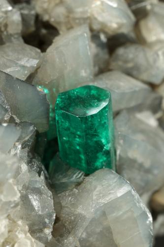 Beryl (variety emerald), Calcite, Dolomite, Pyrite<br />La Pita mining district, Polveros Mine, Municipio Maripí, Western Emerald Belt, Boyacá Department, Colombia<br />58x78x96mm, xl=9mm<br /> (Author: Fiebre Verde)