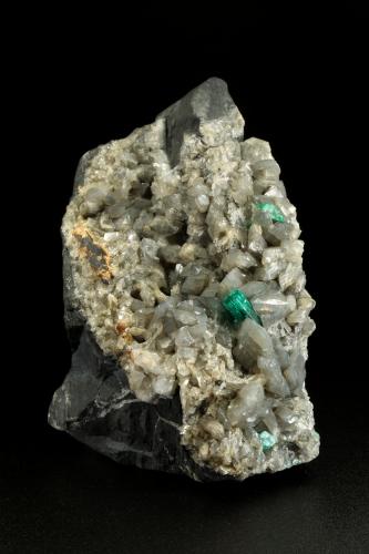 Beryl (variety emerald), Calcite, Dolomite, Pyrite<br />La Pita mining district, Polveros Mine, Municipio Maripí, Western Emerald Belt, Boyacá Department, Colombia<br />58x78x96mm, xl=9mm<br /> (Author: Fiebre Verde)