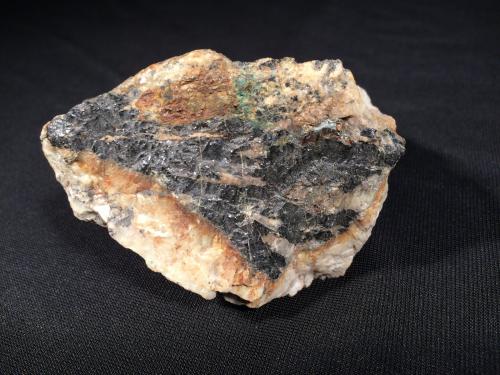 Columbite, Uraninite, Feldspar<br />Ray Mica Mine, Hurricane Mountain, Burnsville, Spruce Pine District, Yancey County, North Carolina, USA<br />77 mm x 70 mm x 55 mm<br /> (Author: Robert Seitz)