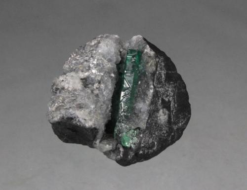 Beryl (variety emerald), Calcite<br />Coscuez mining district, Municipio San Pablo de Borbur, Western Emerald Belt, Boyacá Department, Colombia<br />50mm x 42mm x 37mm<br /> (Author: Don Lum)