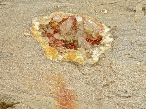 Calcite on Dolomite<br />State Route 56 road cut, Canton, Washington County, Indiana, USA<br />geode is 18+ cm, the largest calcites might be 6 - 7 cm<br /> (Author: Bob Harman)