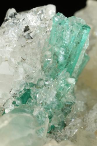 Beryl (variety emerald), Calcite, Quartz<br />Peñas Blancas Mine, Municipio San Pablo de Borbur, Western Emerald Belt, Boyacá Department, Colombia<br />78x51x44mm, main xl=12mm<br /> (Author: Fiebre Verde)