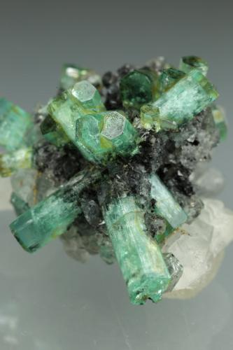 Beryl (variety emerald), Calcite<br />La Pita mining district, Polveros Mine, Municipio Maripí, Western Emerald Belt, Boyacá Department, Colombia<br />35x35mm<br /> (Author: Fiebre Verde)