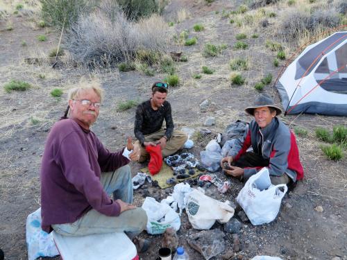 _Unwrapping specimens after a hard days effort. From left to right: Mike Sanders, Fred Ortega, Chris Cowan. Phil Simmons photo. (Author: Philip Simmons)