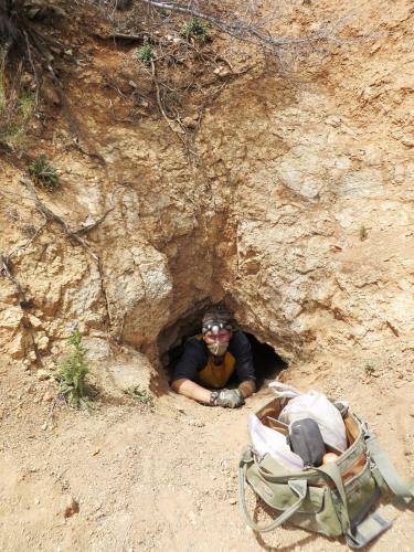 _Crawling into the mine where the fluorite was found. Mike Sanders photo. (Author: Philip Simmons)