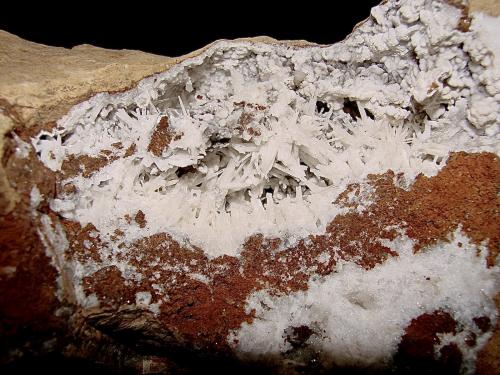 Aragonite on Dolomite (variety ferroan)<br />Monroe County, Indiana, USA<br />the cavity is 11 cm x 5.5 cm the aragonite needles are up to 1.0 cm<br /> (Author: Bob Harman)