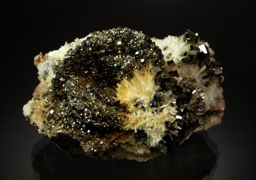 Pyrite and bertrandite<br />Akchatau, Shet, Región Karaganda, Kazajstán<br />4.0 x 6.0 x 9.0 cm<br /> (Author: crosstimber)