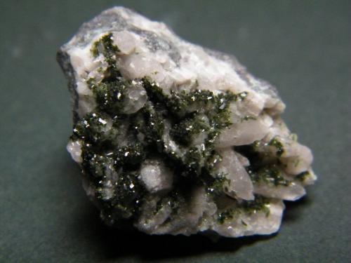 Olivenite and Calcite<br />Tsumeb Mine, Tsumeb, Otjikoto Region, Namibia<br />28mm x 21mm x 16mm<br /> (Author: Heimo Hellwig)