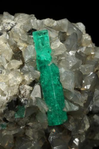 Beryl (variety emerald), Calcite, Dolomite<br />La Pita mining district, Municipio Maripí, Western Emerald Belt, Boyacá Department, Colombia<br />40x43x29mm, xl=22mm<br /> (Author: Fiebre Verde)