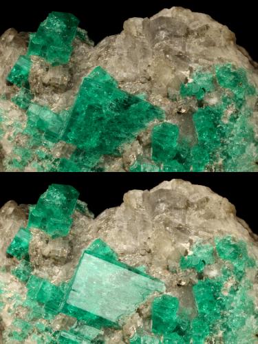 Beryl (variety emerald), Calcite, Muscovite<br />La Pita mining district, Cunas Mine, Municipio Maripí, Western Emerald Belt, Boyacá Department, Colombia<br />40x63x47mm, largest xl=14x11mm<br /> (Author: Fiebre Verde)