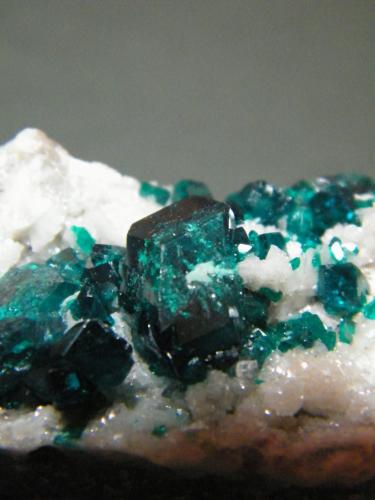 Dioptase on Calcite<br />Tsumeb Mine, Tsumeb, Otjikoto Region, Namibia<br />60mm x 29mm x 25mm<br /> (Author: Heimo Hellwig)