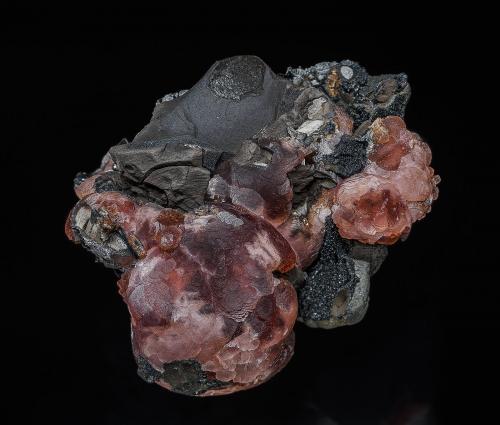 Rhodochrosite<br />Zona minera N'Chwaning, Kuruman, Kalahari manganese field (KMF), Provincia Septentrional del Cabo, Sudáfrica<br />4.9 x 3.9 cm<br /> (Author: am mizunaka)