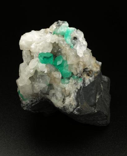 Beryl (variety emerald), Calcite, Dolomite, Pyrite<br />La Pita mining district, Polveros Mine, Municipio Maripí, Western Emerald Belt, Boyacá Department, Colombia<br />52x56x46mm, xls=10 & 5mm<br /> (Author: Fiebre Verde)