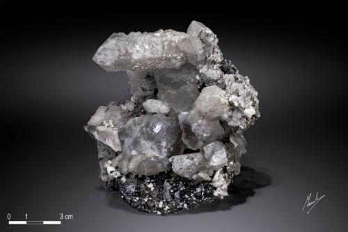 Quartz,Fluorite, Calcite and Magnetite<br />Huanggang Mines, Hexigten Banner (Kèshíkèténg Qí), Chifeng (Ulanhad), Inner Mongolia Autonomous Region, China<br />102x 102 mm<br /> (Author: Manuel Mesa)