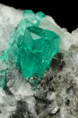 Beryl (variety emerald), Calcite<br />La Pita mining district, Cunas Mine, Municipio Maripí, Western Emerald Belt, Boyacá Department, Colombia<br />43x63x56mm, xl=10x6mm<br /> (Author: Fiebre Verde)