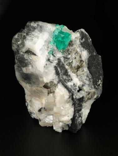 Beryl (variety emerald), Calcite<br />La Pita mining district, Cunas Mine, Municipio Maripí, Western Emerald Belt, Boyacá Department, Colombia<br />43x63x56mm, xl=10x6mm<br /> (Author: Fiebre Verde)