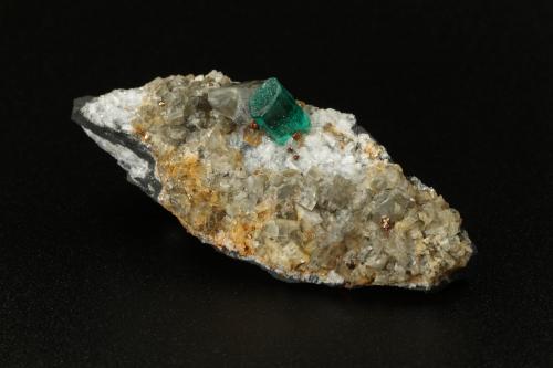 Beryl (variety emerald), Albite (variety cleavelandite), Calcite, Pyrite<br />Chivor mining district, Municipio Chivor, Eastern Emerald Belt, Boyacá Department, Colombia<br />51x18x21mm, xl=5mm<br /> (Author: Fiebre Verde)