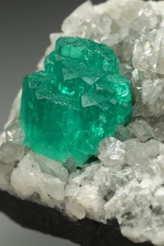 Beryl (variety emerald), Calcite, Dolomite<br />La Pita mining district, Municipio Maripí, Western Emerald Belt, Boyacá Department, Colombia<br />28x36x19mm, aggregate=6x9mm<br /> (Author: Fiebre Verde)