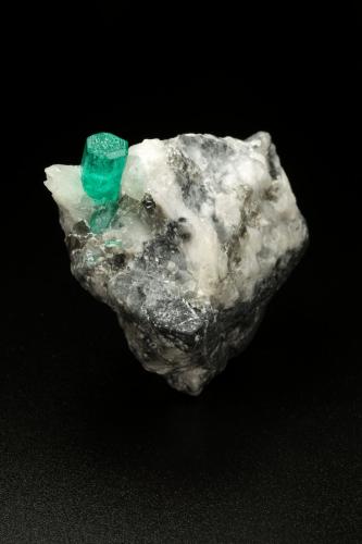 Beryl (variety emerald), Calcite<br />La Pita mining district, Cunas Mine, Municipio Maripí, Western Emerald Belt, Boyacá Department, Colombia<br />37x41x24mm, xl=9mm<br /> (Author: Fiebre Verde)