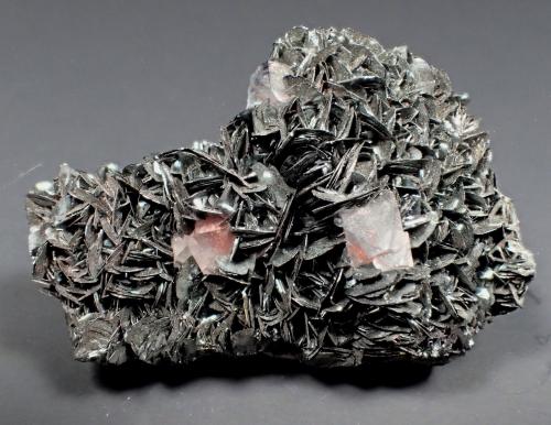 Hematite (variety specularite) on kidney ore, Quartz<br />Florence Mine, Egremont, West Cumberland Iron Field, former Cumberland, Cumbria, England / United Kingdom<br />52 mm x 33 mm x 18 mm<br /> (Author: Don Lum)