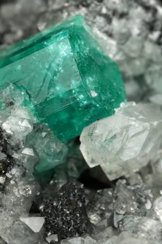 Beryl (variety emerald), Calcite, Pyrite<br />La Pita mining district, Polveros Mine, Municipio Maripí, Western Emerald Belt, Boyacá Department, Colombia<br />77x86x68mm, xl=19mm<br /> (Author: Fiebre Verde)