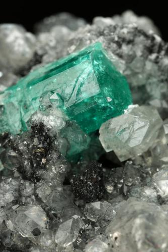 Beryl (variety emerald), Calcite, Pyrite<br />La Pita mining district, Polveros Mine, Municipio Maripí, Western Emerald Belt, Boyacá Department, Colombia<br />77x86x68mm, xl=19mm<br /> (Author: Fiebre Verde)