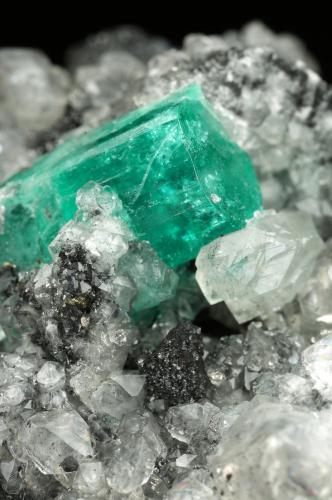 Beryl (variety emerald), Calcite, Pyrite<br />La Pita mining district, Polveros Mine, Municipio Maripí, Western Emerald Belt, Boyacá Department, Colombia<br />77x86x68mm, xl=19mm<br /> (Author: Fiebre Verde)