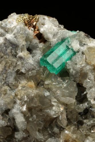 Beryl (variety emerald), Calcite, Dolomite, Pyrite<br />La Pita mining district, Municipio Maripí, Western Emerald Belt, Boyacá Department, Colombia<br />67x53x27mm, xl=11mm<br /> (Author: Fiebre Verde)