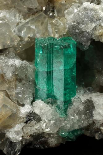 Beryl (variety emerald), Calcite, Dolomite, Pyrite<br />La Pita mining district, Municipio Maripí, Western Emerald Belt, Boyacá Department, Colombia<br />67x53x27mm, xl=11mm<br /> (Author: Fiebre Verde)