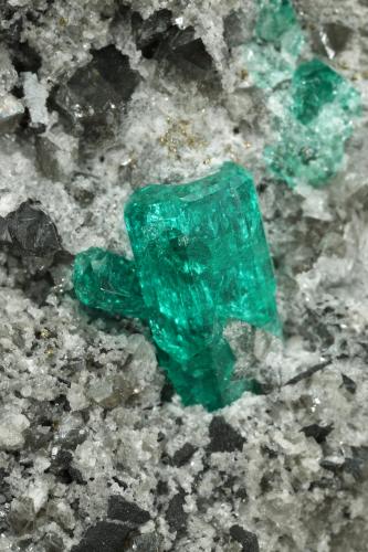 Beryl (variety emerald), Albite (variety cleavelandite), Dolomite, Pyrite<br />Chivor mining district, El Oriente Mine, Municipio Chivor, Eastern Emerald Belt, Boyacá Department, Colombia<br />94x73x49mm, main xls=15 & 13mm<br /> (Author: Fiebre Verde)