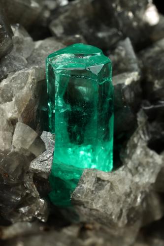 Beryl (variety emerald), Calcite, Pyrite<br />Coscuez mining district, Municipio San Pablo de Borbur, Western Emerald Belt, Boyacá Department, Colombia<br />67x47x55mm, xl=19mm<br /> (Author: Fiebre Verde)