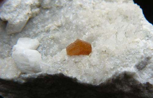 Hydroxyl-bastnäsite-(Ce)<br />Trimouns Mine, Luzenac, Haute-Ariège, Foix, Ariège Department, Occitanie, France<br />crysral : 0,7 cm<br /> (Author: Benj)