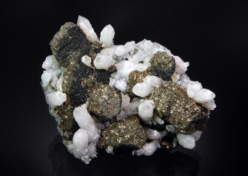 Pyrite ps. after pyrrhotite<br />Herja Mine, Chiuzbaia, Baia Sprie, Maramures, Romania<br />4.9 x 7.0 x 9.1 cm.<br /> (Author: crosstimber)