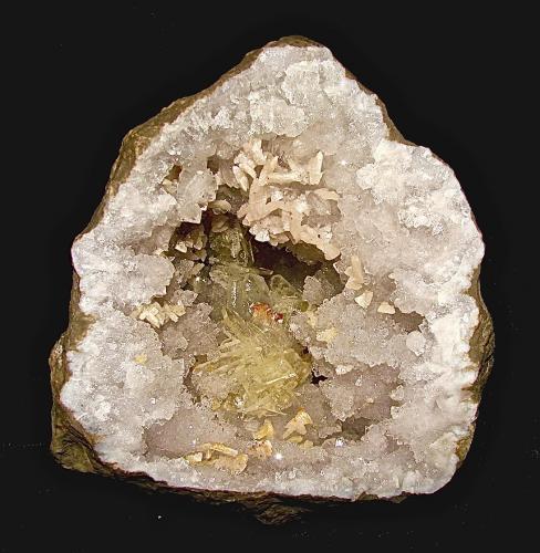 Baryte and Dolomite on Quartz<br />Zona Harrodsburg, Clear Creek, Condado Monroe, Indiana, USA<br />The example is 10 cm. The baryte cluster is about 4.5 cm with the largest terminated blades about 1.3 cm<br /> (Author: Bob Harman)