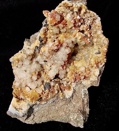 Sphalerite, Calcite and Dolomite with Quartz<br />Afloramientos antigua Carretera Estatal 37, Bloomington (Norte), Condado Monroe, Indiana, USA<br />Specimen is 12 cm. The sphalerite is up to 1 cm. The calcite is up to 1 cm.<br /> (Author: Bob Harman)