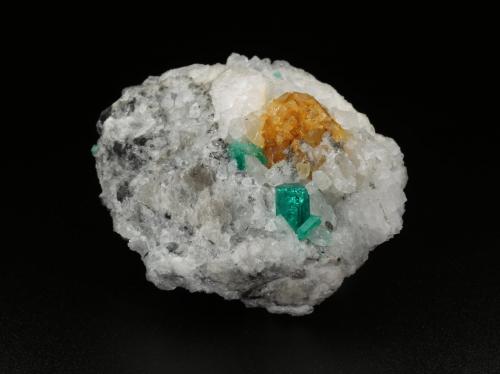 Beryl (variety emerald), Calcite<br />Coscuez mining district, Municipio San Pablo de Borbur, Western Emerald Belt, Boyacá Department, Colombia<br />49x36x45mm, xl=8mm<br /> (Author: Fiebre Verde)