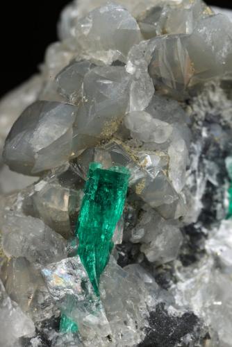 Beryl (variety emerald), Calcite, Dolomite<br />La Pita mining district, Cunas Mine, Municipio Maripí, Western Emerald Belt, Boyacá Department, Colombia<br />47x45x47mm, xl=18mm - 2 xls in the back: 11mm & 7mm<br /> (Author: Fiebre Verde)