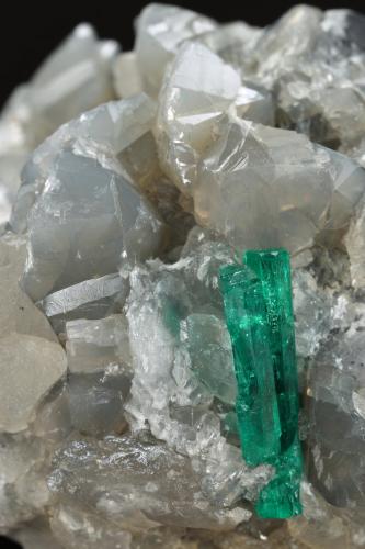 Beryl (variety emerald), Calcite, Dolomite<br />La Pita mining district, Cunas Mine, Municipio Maripí, Western Emerald Belt, Boyacá Department, Colombia<br />47x45x47mm, xl=18mm - 2 xls in the back: 11mm & 7mm<br /> (Author: Fiebre Verde)