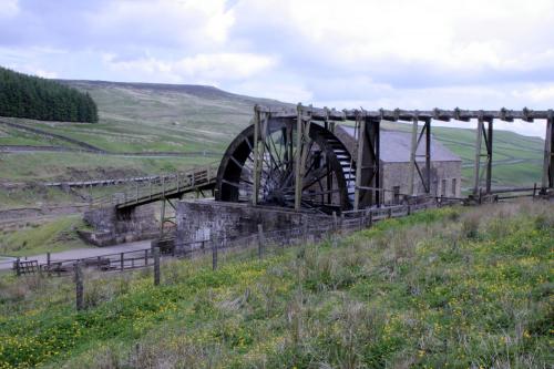 The restored Killhope waterwheel, which provided power to ore separation jigs in the adjacent building. (Author: Jesse Fisher)
