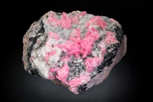 Rhodochrosite<br />Grupo Mina Sunnyside (Mina American Tunnel), Pico Bonita, Gladstone, Distrito Eureka, Condado San Juan, Colorado, USA<br />5.2 x 7.5 x 7.6 cm<br /> (Author: crosstimber)