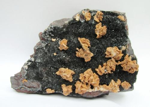 Dolomite, Hematite<br />Florence Mine, Egremont, West Cumberland Iron Field, former Cumberland, Cumbria, England / United Kingdom<br />Specimen size 12 cm, largest dolomite crystals 7 mm<br /> (Author: Tobi)