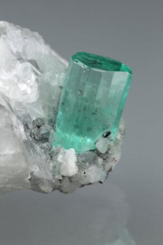 Beryl (variety emerald), Calcite<br />Coscuez mining district, Municipio San Pablo de Borbur, Western Emerald Belt, Boyacá Department, Colombia<br />42x20x18mm, xl=9mm<br /> (Author: Fiebre Verde)