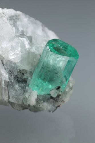 Beryl (variety emerald), Calcite<br />Coscuez mining district, Municipio San Pablo de Borbur, Western Emerald Belt, Boyacá Department, Colombia<br />42x20x18mm, xl=9mm<br /> (Author: Fiebre Verde)