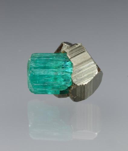 Beryl (variety emerald), Pyrite<br />Chivor mining district, El Oriente Mine, Municipio Chivor, Eastern Emerald Belt, Boyacá Department, Colombia<br />xl=7mm<br /> (Author: Fiebre Verde)