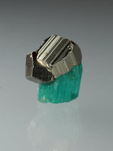 Beryl (variety emerald), Pyrite<br />Chivor mining district, El Oriente Mine, Municipio Chivor, Eastern Emerald Belt, Boyacá Department, Colombia<br />xl=7mm<br /> (Author: Fiebre Verde)