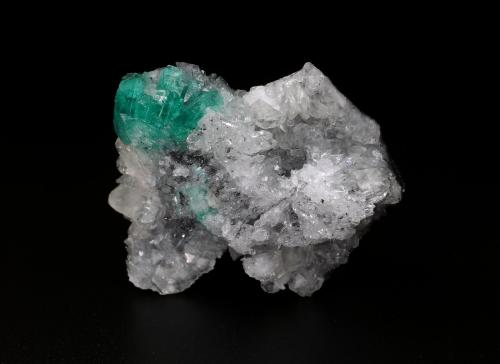 Beryl (variety emerald), Calcite<br />Coscuez mining district, Municipio San Pablo de Borbur, Western Emerald Belt, Boyacá Department, Colombia<br />40x35x16mm, aggregate=10x15mm<br /> (Author: Fiebre Verde)