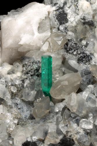 Beryl (variety emerald), Calcite, Dolomite, Pyrite<br />Coscuez mining district, Municipio San Pablo de Borbur, Western Emerald Belt, Boyacá Department, Colombia<br />46x68x26mm, xl=11mm<br /> (Author: Fiebre Verde)