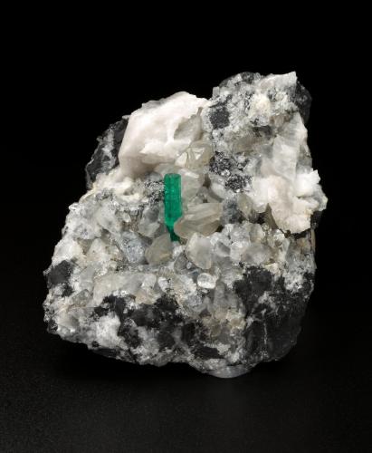 Beryl (variety emerald), Calcite, Dolomite, Pyrite<br />Coscuez mining district, Municipio San Pablo de Borbur, Western Emerald Belt, Boyacá Department, Colombia<br />46x68x26mm, xl=11mm<br /> (Author: Fiebre Verde)