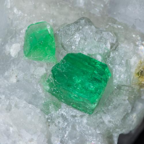 Beryl (variety emerald), Calcite<br />La Pita mining district, Municipio Maripí, Western Emerald Belt, Boyacá Department, Colombia<br />52mm x 46mm x 22mm<br /> (Author: Bergur_E_Sigurdarson)